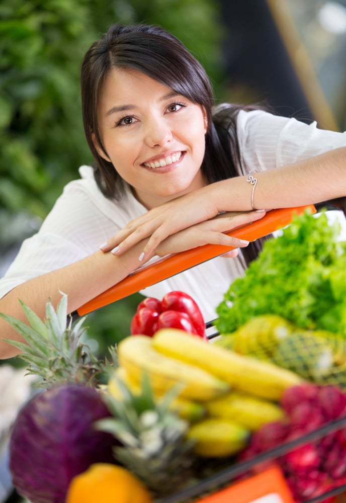 Healthy woman shopping for groceries at the supermarket